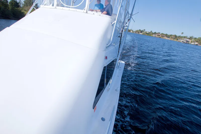 Fish Daddy Yacht Photos Pics 1998 Luhrs 36 Convertible yacht cruising on a sunny day.