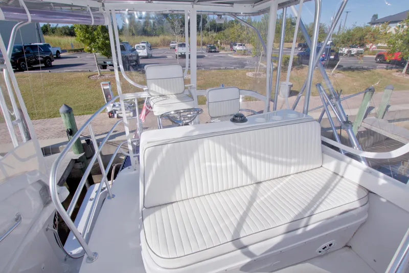Fish Daddy Yacht Photos Pics 1998 Luhrs 36 Convertible boat interior with white seating and helm station.