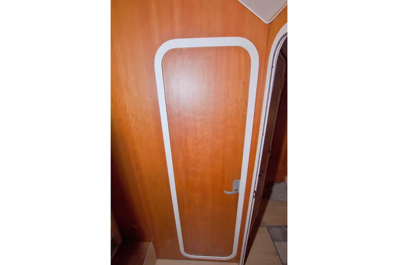 Fish Daddy Yacht Photos Pics Wooden interior door of 1998 Luhrs 36 Convertible boat.