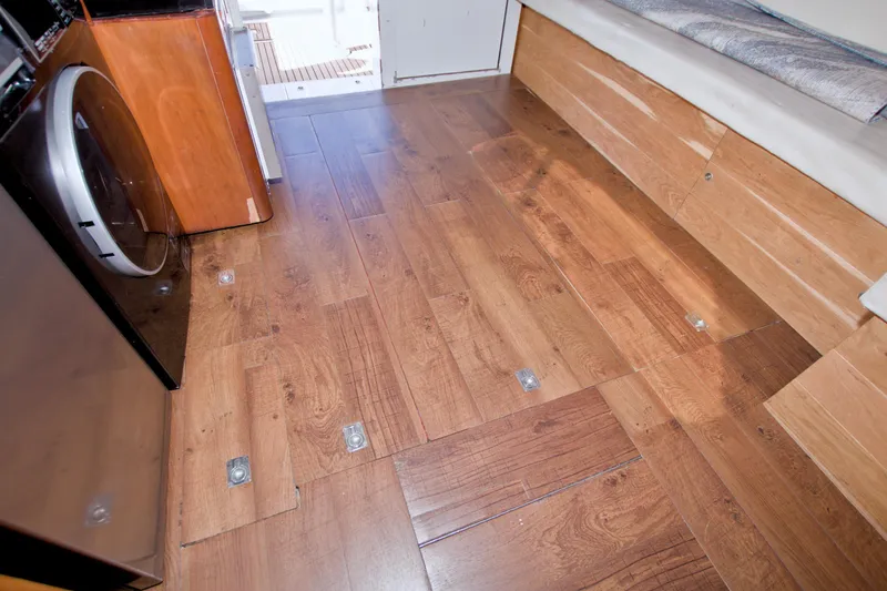 Fish Daddy Yacht Photos Pics 1998 Luhrs 36 Convertible interior with wooden flooring and modern appliances.