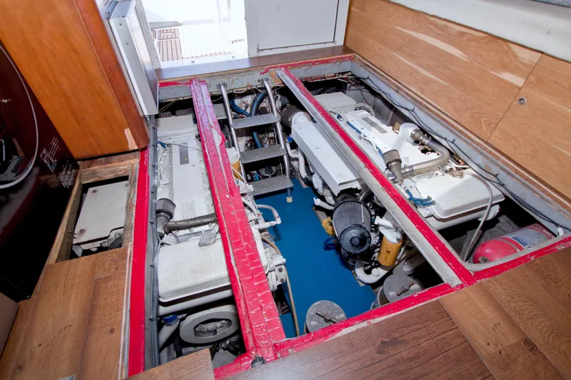 Fish Daddy Yacht Photos Pics Engine room of 1998 Luhrs 36 Convertible boat with visible machinery and components.