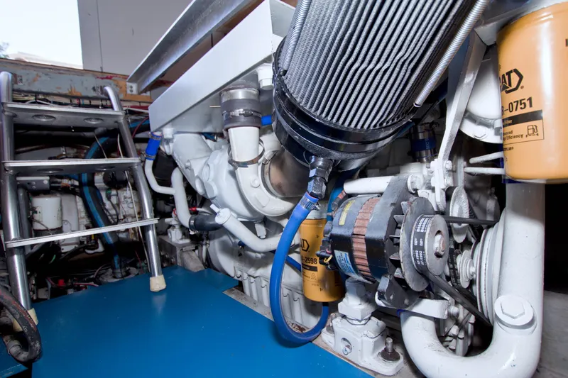 Fish Daddy Yacht Photos Pics Engine room of 1998 Luhrs 36 Convertible boat, showcasing mechanical components.