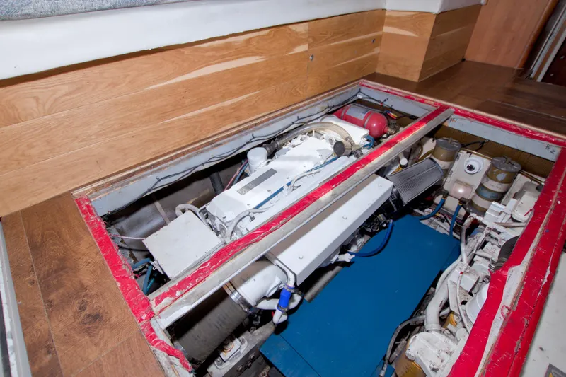 Fish Daddy Yacht Photos Pics Engine compartment of 1998 Luhrs 36 Convertible boat, showcasing mechanical components.