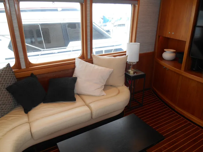 Suspense Yacht Photos Pics Luxurious 2005 Inace Trawler interior with cozy seating and elegant decor.