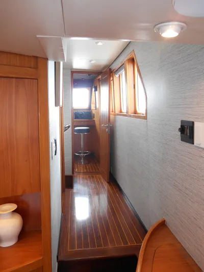 Suspense Yacht Photos Pics 2005 Inace Trawler interior with wooden flooring and modern design.