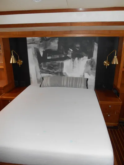 Suspense Yacht Photos Pics 2005 Inace Trawler bedroom with modern decor and wall art.