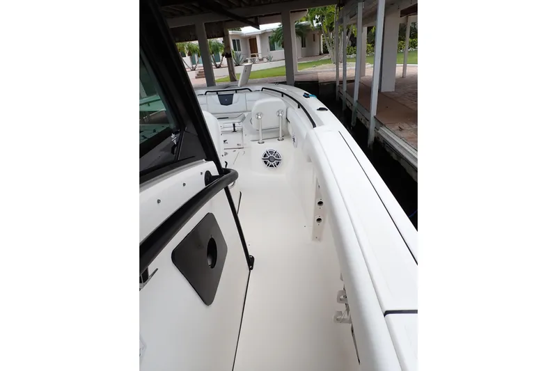  Yacht Photos Pics 2019 Wellcraft 352 Fisherman boat interior, featuring sleek white deck and modern design.