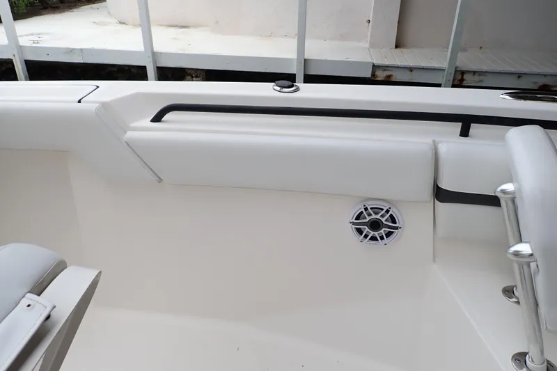  Yacht Photos Pics 2019 Wellcraft 352 Fisherman boat interior with speaker and seating detail.