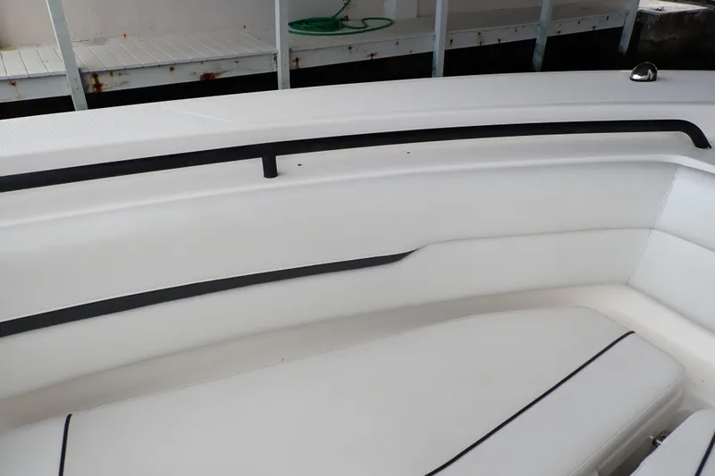  Yacht Photos Pics 2019 Wellcraft 352 Fisherman boat interior with white seating and black accents.