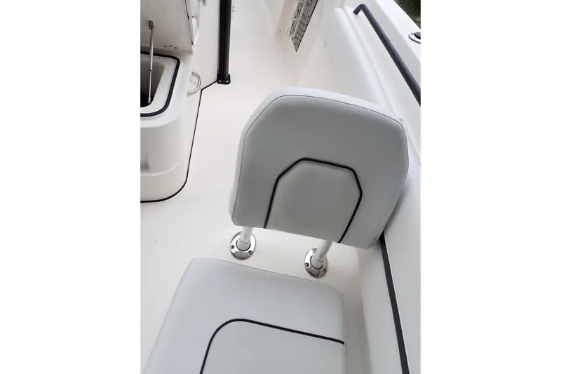  Yacht Photos Pics 2019 Wellcraft 352 Fisherman boat interior with white seating and storage compartment.