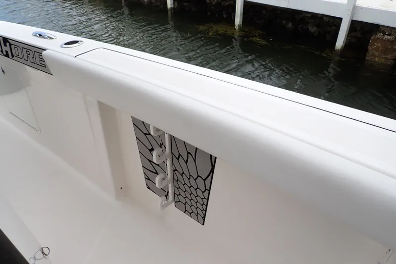  Yacht Photos Pics 2019 Wellcraft 352 Fisherman boat detail with rod holders and water view.