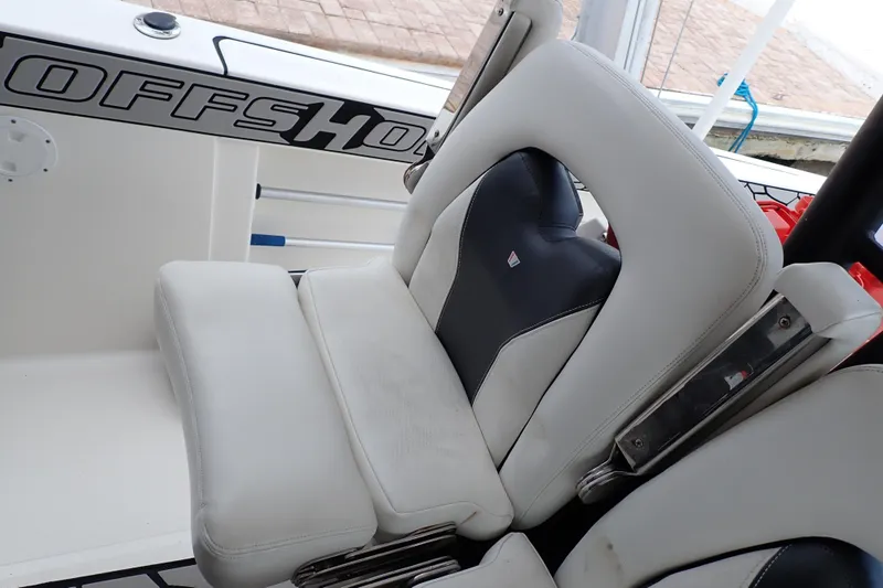  Yacht Photos Pics 2019 Wellcraft 352 Fisherman boat seat with white and black upholstery.