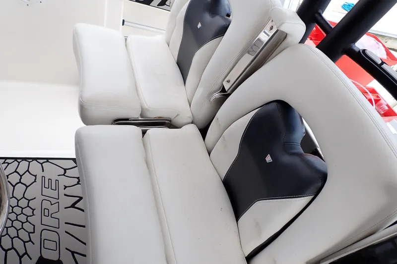  Yacht Photos Pics 2019 Wellcraft 352 Fisherman boat seats, white and black upholstery, close-up view.