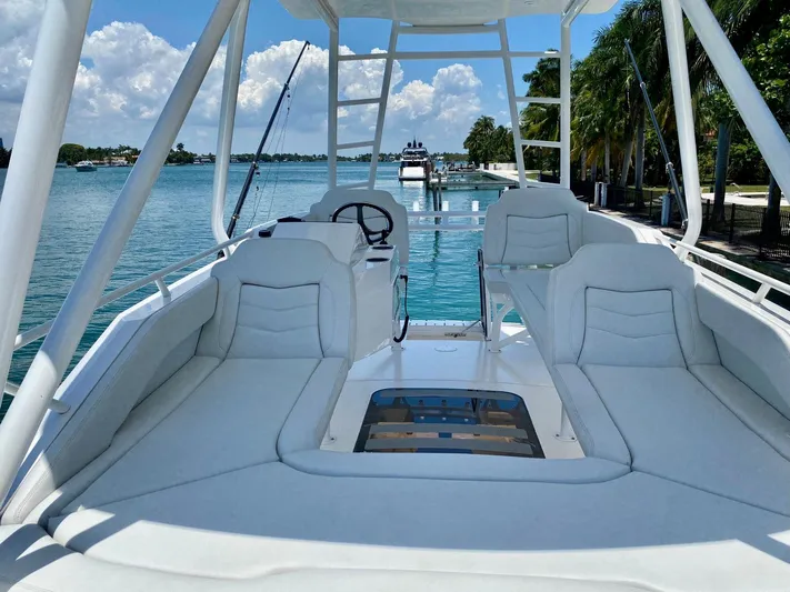 Scout 530 Lxf Yacht Photos Pics Luxurious 2021 Scout 530 LXF boat interior with plush seating and scenic water view.
