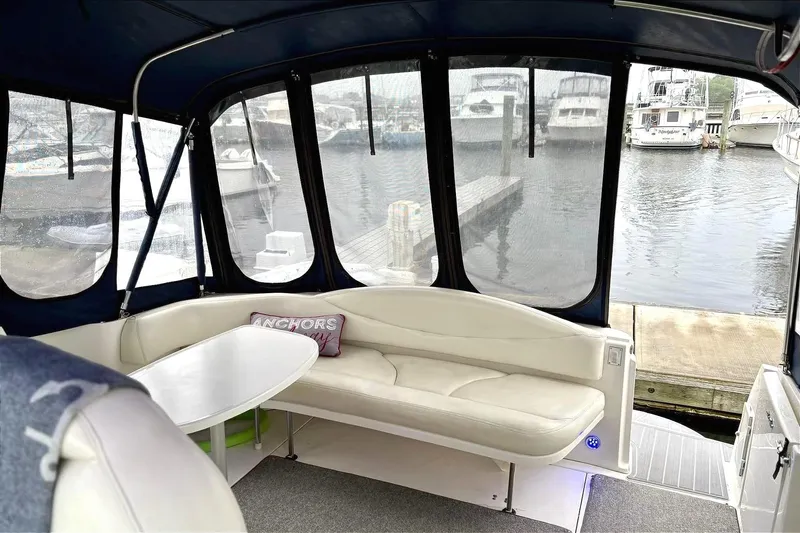  Yacht Photos Pics Interior view of a 2003 Sea Ray 380 Sundancer yacht with marina backdrop.