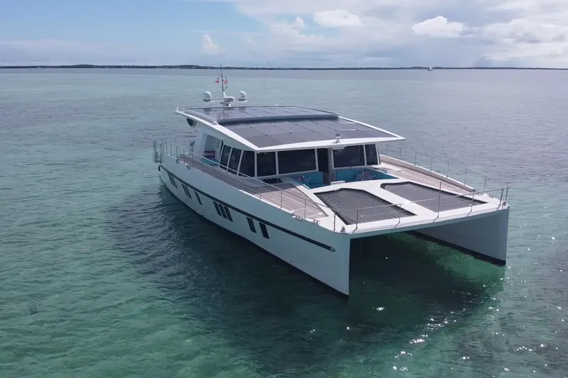 Firefly Yacht Photos Pics Solar-powered Serenity 64 yacht cruising on clear waters, 2018 model.