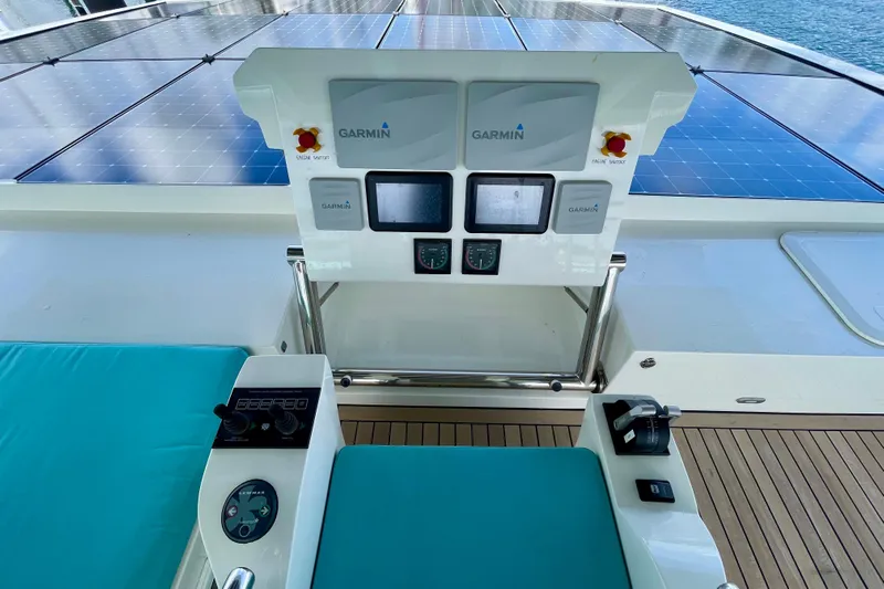 Firefly Yacht Photos Pics Control panel of a 2018 Serenity 64 yacht with Garmin navigation systems.