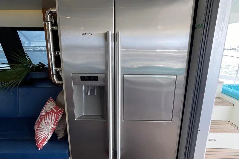Firefly Yacht Photos Pics Stainless steel Siemens refrigerator on Serenity 64 yacht, 2018 model, with water dispenser.