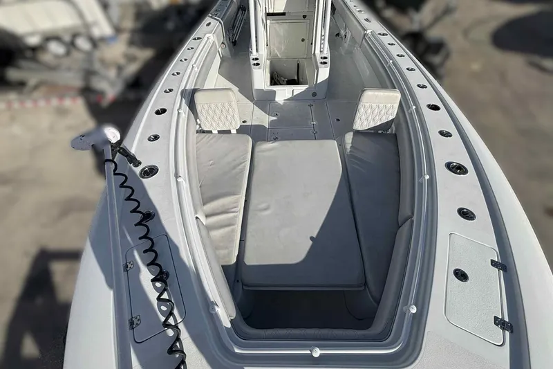 El Viaje Yacht Photos Pics 2023 Andros Offshore 32 boat interior with cushioned seating and storage compartments.