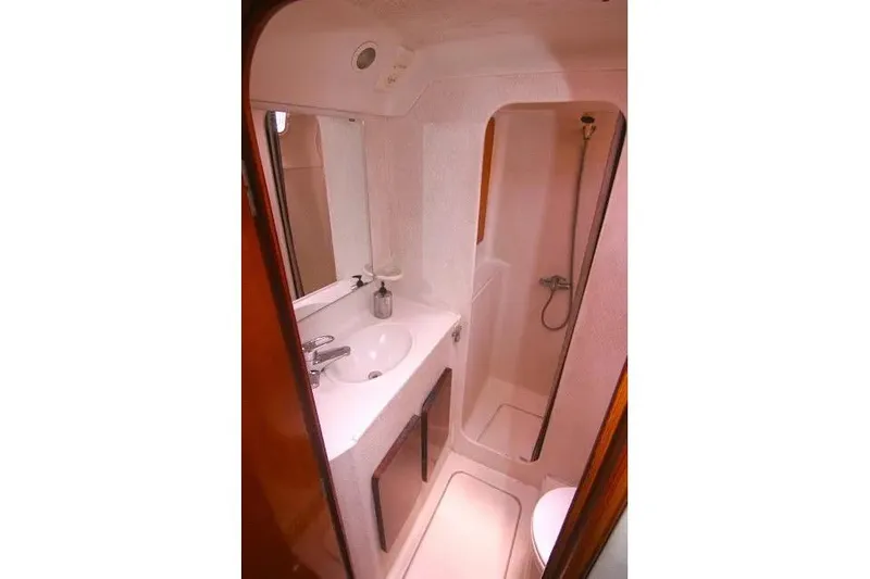 Scout Yacht Photos Pics Compact bathroom in 1992 Privilege 482 yacht with sink and shower.