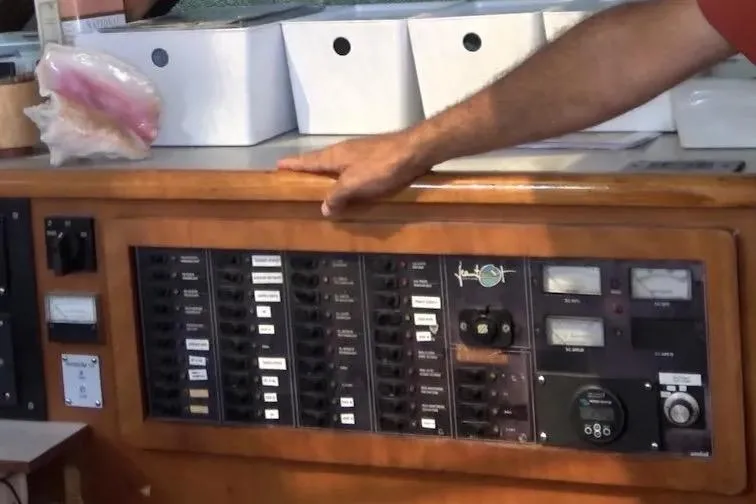 Scout Yacht Photos Pics Control panel of a 1992 Privilege 482 yacht with various switches and gauges.