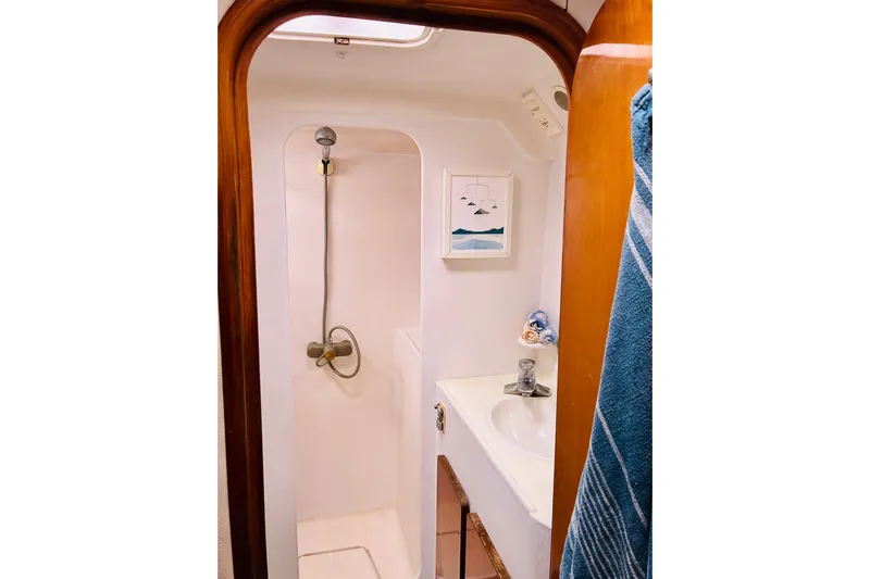 Scout Yacht Photos Pics Bathroom interior of 1992 Privilege 482 yacht with shower and sink.
