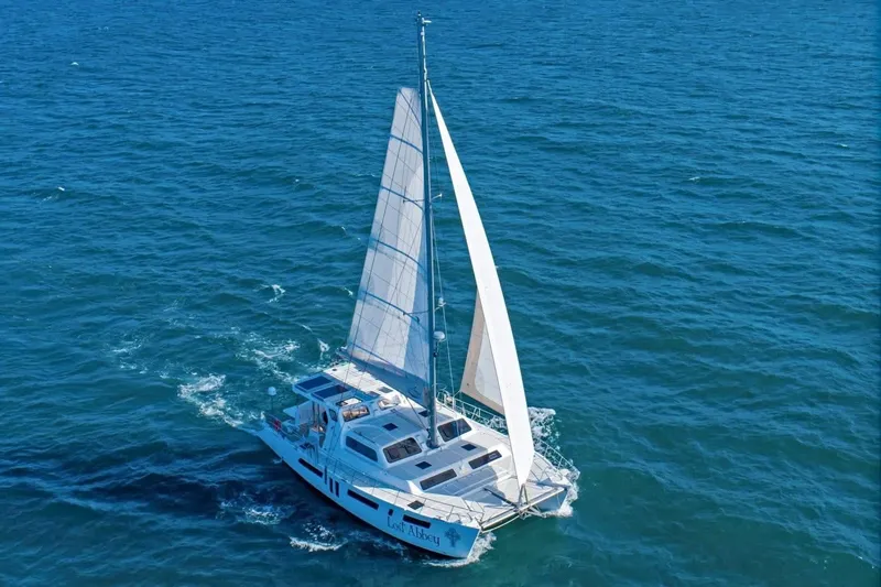 Lost Abbey Yacht Photos Pics 2021 Royal Cape Catamarans Majestic sailing on open blue sea.