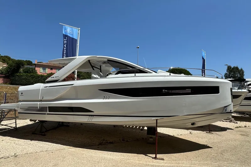  Yacht Photos Pics 2026 Jeanneau DB/37 IB luxury yacht displayed outdoors under clear blue sky.
