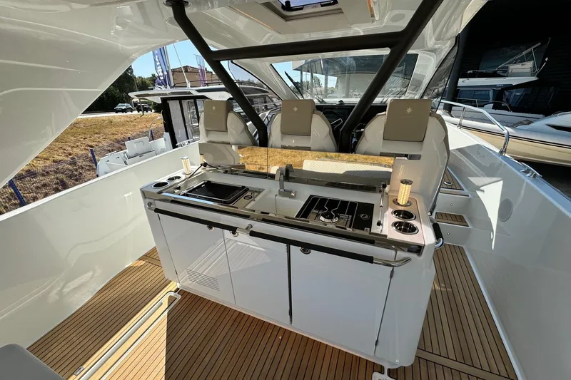  Yacht Photos Pics 2026 Jeanneau DB/37 IB yacht interior with sleek kitchen and modern design.