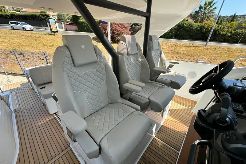  Yacht Photos Pics Luxurious seating on the 2026 Jeanneau DB/37 IB boat, featuring elegant design and comfort.