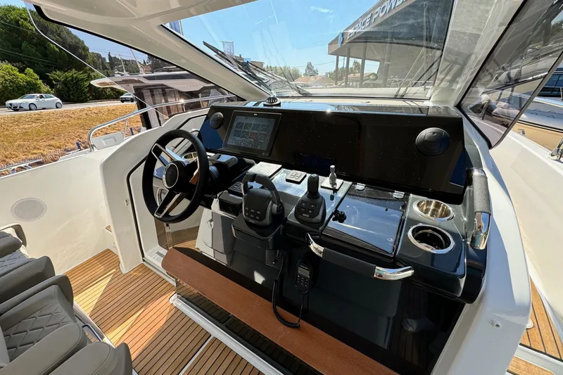  Yacht Photos Pics 2026 Jeanneau DB/37 IB boat cockpit with modern controls and sleek design.