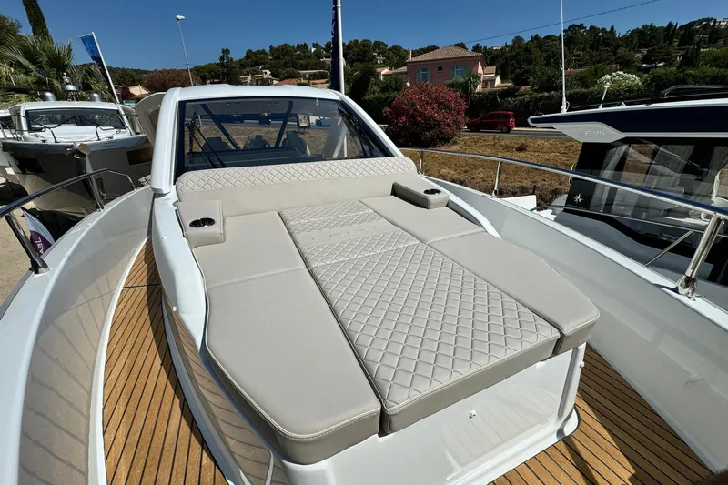  Yacht Photos Pics 2026 Jeanneau DB/37 IB boat with luxurious sunbed on teak deck.