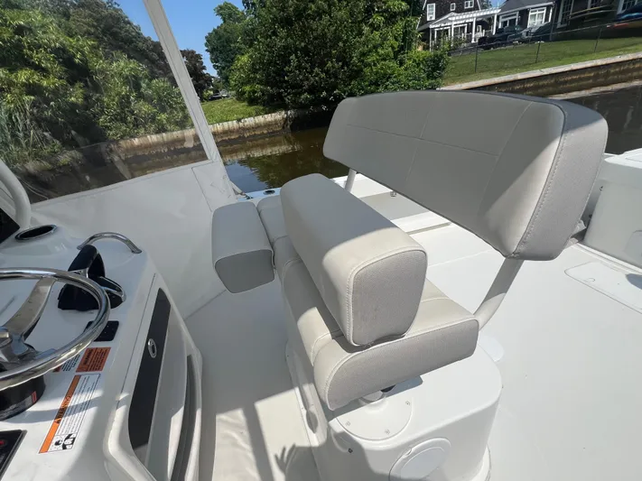  Yacht Photos Pics 2023 Parker 2801 Center Console boat interior with helm seat and steering wheel.