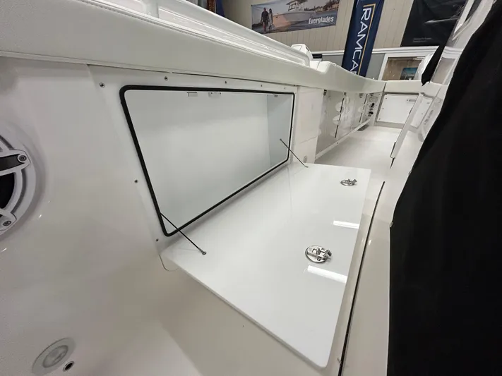  Yacht Photos Pics 2024 Everglades 285 Center Console boat storage compartment open.