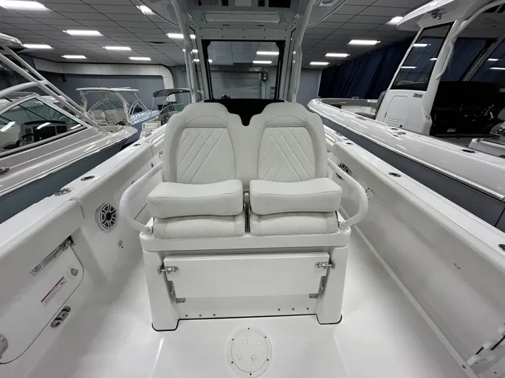  Yacht Photos Pics 2024 Everglades 285 Center Console boat interior with dual cushioned seats.