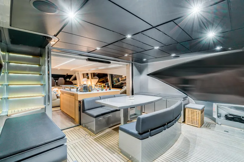  Yacht Photos Pics Luxurious interior of a 2012 Pershing 92 yacht with modern seating and ambient lighting.