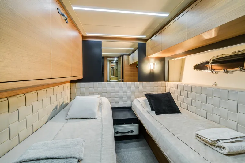  Yacht Photos Pics Luxurious twin cabin interior of 2012 Pershing 92 yacht with modern design.