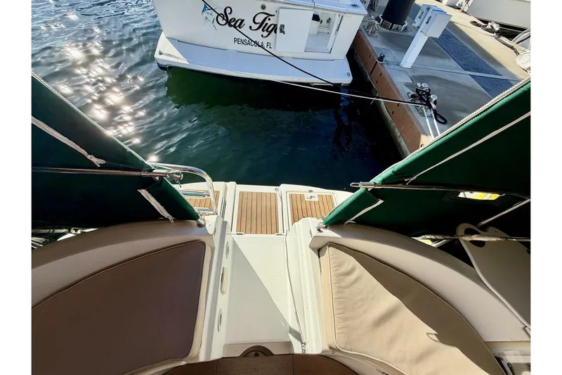 Eda Yacht Photos Pics Beneteau Oceanis 461 sailboat stern view, docked at marina, 2000 model.