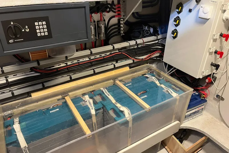 Yacht Photos Pics Electrical system setup in a 2017 NEEL 51, featuring batteries and control panels.