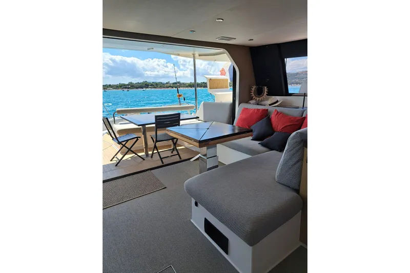  Yacht Photos Pics Interior of 2017 NEEL 51 yacht with cozy seating and ocean view.