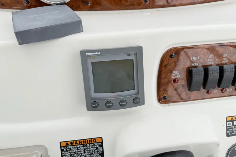Baby Cake Yacht Photos Pics Raymarine ST60 depth display on 2004 Meridian 381 Sedan boat dashboard.
