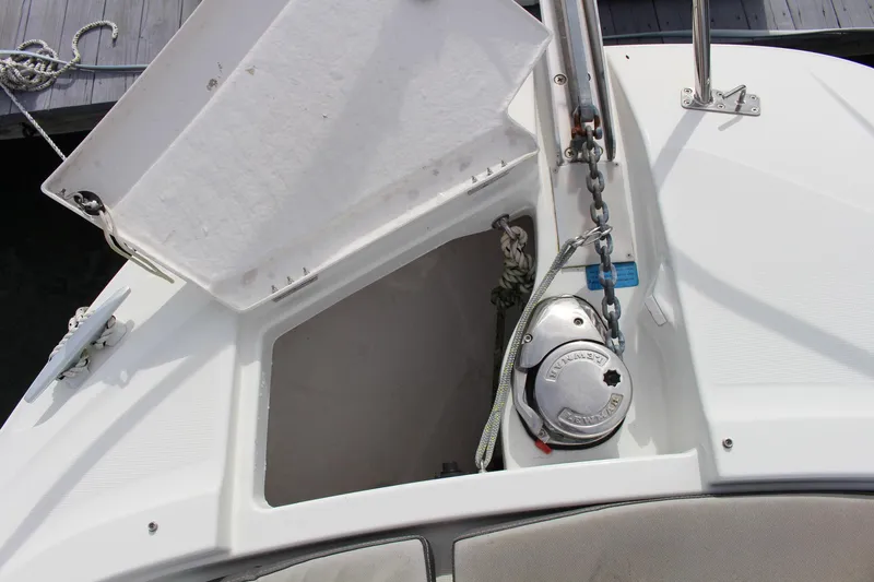  Yacht Photos Pics 2021 Jeanneau Leader 9.0 WA anchor locker with open hatch and chain mechanism.