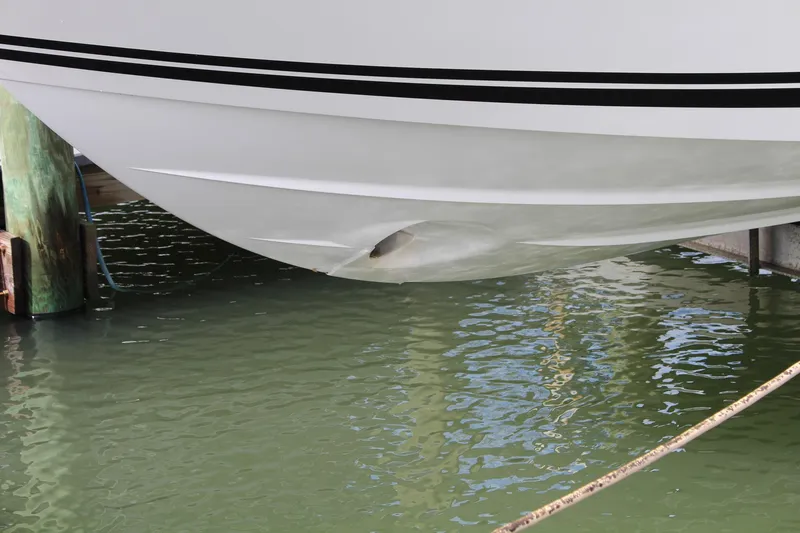  Yacht Photos Pics 2021 Jeanneau Leader 9.0 WA boat hull with visible damage above water.