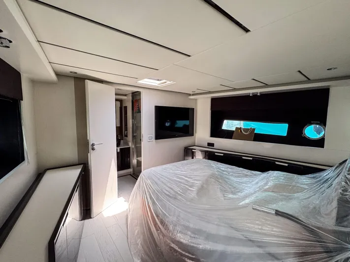 My Life Five III Yacht Photos Pics Luxurious interior of 2023 Rizzardi GR 63 yacht cabin with modern furnishings.