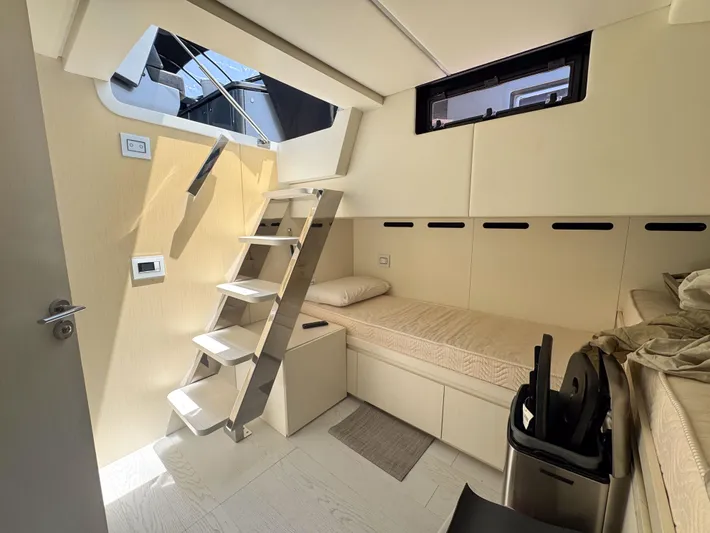 My Life Five III Yacht Photos Pics 2023 Rizzardi GR 63 yacht interior with modern design, featuring a compact cabin and sleek staircase.