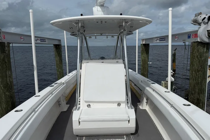  Yacht Photos Pics 2011 Contender 32 ST boat docked, showcasing spacious deck and ocean view.