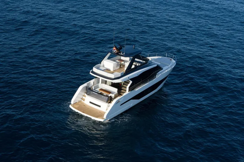 As 5 Yacht Photos Pics 2026 Astondoa AS 5 yacht cruising on open sea, aerial view.