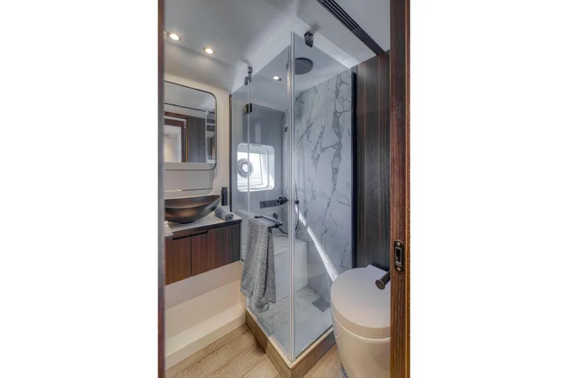 As 5 Yacht Photos Pics Luxurious bathroom in 2026 Astondoa AS 5 yacht with modern fixtures and marble accents.