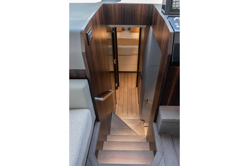 As 5 Yacht Photos Pics Staircase leading to lower deck of 2026 Astondoa AS 5 yacht interior.