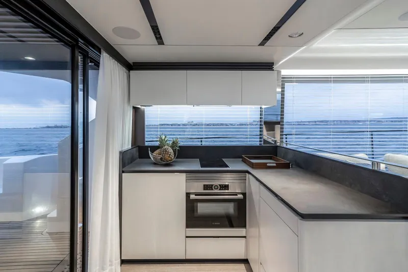 As 5 Yacht Photos Pics Modern kitchen interior on 2026 Astondoa AS 5 yacht with ocean view.